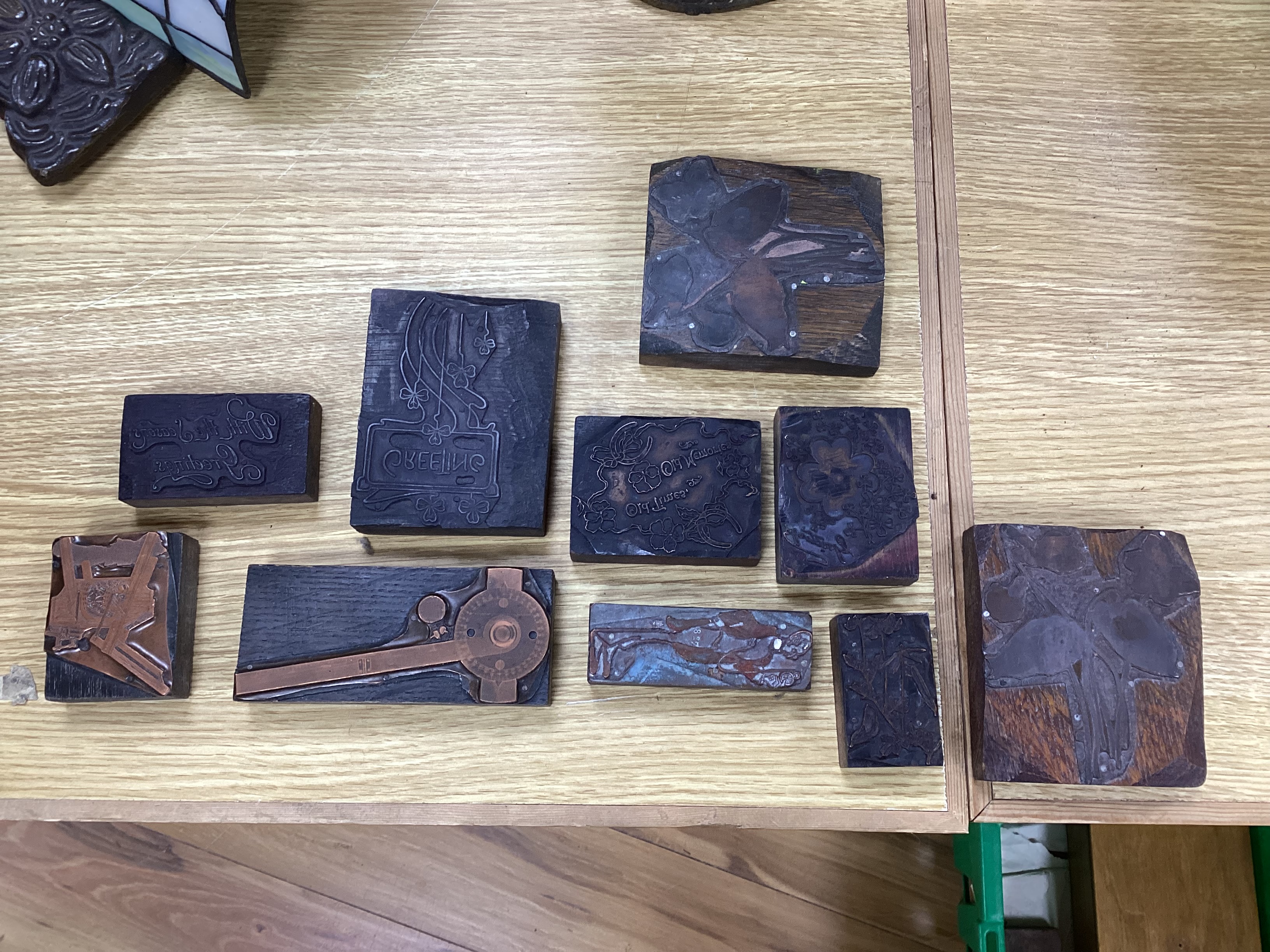 A collection of decorative metal printing blocks, mainly 20th century examples